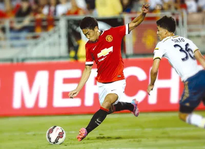 Shinji Kagawa (trái) và Man.United đang rất hưng phấn sau trận thắng LA Galaxy 7-0. Shinji Kagawa (trái) và Man.United đang rất hưng phấn sau trận thắng LA Galaxy 7-0.