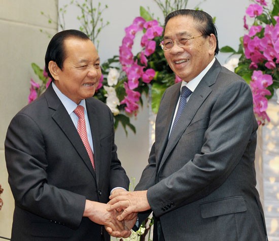 Secretary of HCMC Party Committee Le Thanh Hai (L) and President of Laos People's Democratic Republic Choummaly Sayasone at the meeting yesterday. (Photo:SGGP) Secretary of HCMC Party Committee Le Thanh Hai (L) and President of Laos People's Democratic Republic Choummaly Sayasone at the meeting yesterday. (Photo:SGGP)