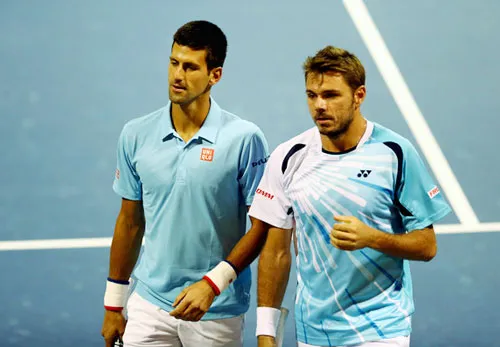 Novak Djokovic (trái) và Stan Wawrinka trong một trận đánh đôi. Novak Djokovic (trái) và Stan Wawrinka trong một trận đánh đôi.