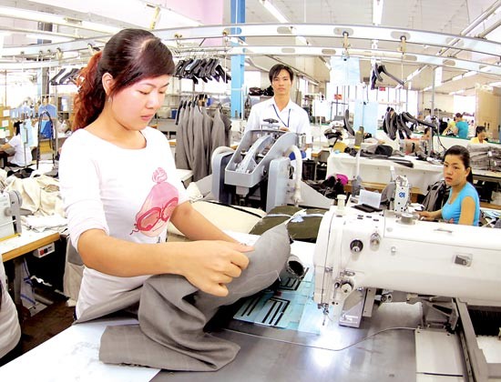 Suit production for exports at Vinatex, who successfully launched an IPO in September (Photo: SGGP) Suit production for exports at Vinatex, who successfully launched an IPO in September (Photo: SGGP)