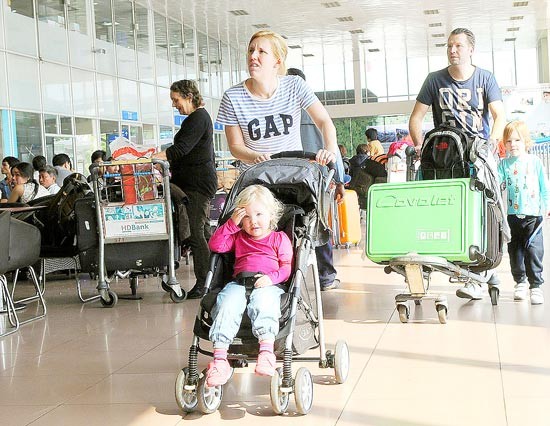 Passengers at Tan Son Nhat International Airport, HCMC (Photo: SGGP) Passengers at Tan Son Nhat International Airport, HCMC (Photo: SGGP)