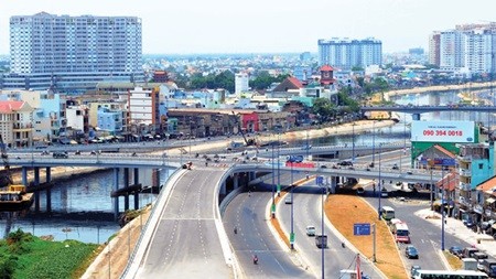 An overview of Calmette Bridge, which connects District 1's Calmette Street and District 4's Doan Van Bo Street in HCM City. The city is developing its first special economic zone in its southern area. (Photo: VNS) An overview of Calmette Bridge, which connects District 1's Calmette Street and District 4's Doan Van Bo Street in HCM City. The city is developing its first special economic zone in its southern area. (Photo: VNS)