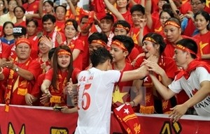 At the final whistle, Vietnamese captain Que Ngoc Hai was in flood of tears at the Kallang National Stadium (Photo: VNA At the final whistle, Vietnamese captain Que Ngoc Hai was in flood of tears at the Kallang National Stadium (Photo: VNA