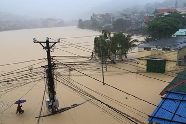 Cam Pha city is flooded in a 40 year record torrential rain in Quang Ninh province on July 26-27 (Photo: SGGP) Cam Pha city is flooded in a 40 year record torrential rain in Quang Ninh province on July 26-27 (Photo: SGGP)