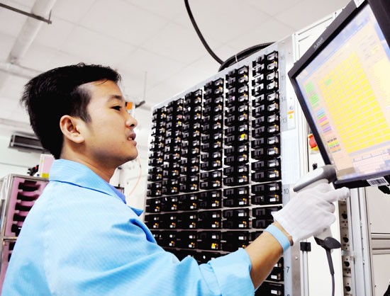 A worker at U.S. Greystone Data Systems Company in Vietnam (Photo: SGGP) A worker at U.S. Greystone Data Systems Company in Vietnam (Photo: SGGP)