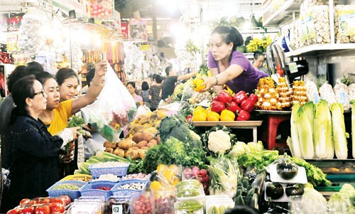 A vegetable stall at a market in HCMC (Photo: SGGP) A vegetable stall at a market in HCMC (Photo: SGGP)
