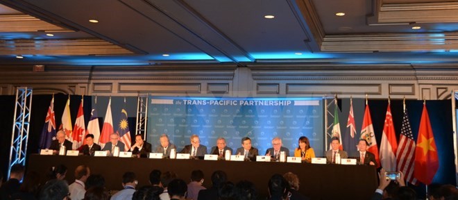 A press conference in US announces the conclusion of the TPP negotiations (Photo: Xinhua/VNA) A press conference in US announces the conclusion of the TPP negotiations (Photo: Xinhua/VNA)