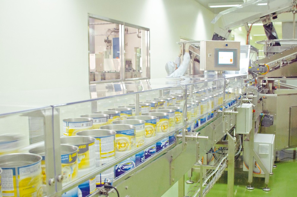 A production line of Vietnam Dairy Products Joint Stock Company in HCMC (Photo: SGGP) A production line of Vietnam Dairy Products Joint Stock Company in HCMC (Photo: SGGP)