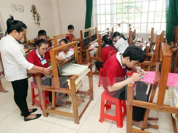 Vocational training given to people with disabilities (Photo: VNA) Vocational training given to people with disabilities (Photo: VNA)