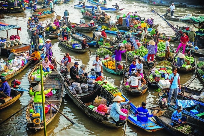 Boat traffic: Cái Răng Floating Market in the Mekong Delta city of Cần Thơ has been recognised by The Ministry of Culture, Sports and Tourism as a national intangible cultural heritage site. (Photo dulichvn.org.vn) Boat traffic: Cái Răng Floating Market in the Mekong Delta city of Cần Thơ has been recognised by The Ministry of Culture, Sports and Tourism as a national intangible cultural heritage site. (Photo dulichvn.org.vn)