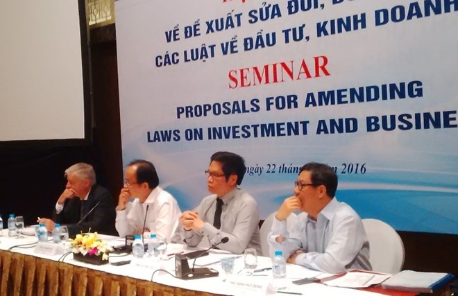 Nearly 40 laws involved in investment and business activities need to be revised to suit practical operations of enterprises, a seminar in Hà Nội was told yesterday Nearly 40 laws involved in investment and business activities need to be revised to suit practical operations of enterprises, a seminar in Hà Nội was told yesterday