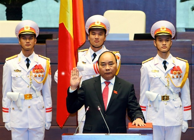 Prime Minister Nguyễn Xuân Phúc at the swearing-in ceremony today (Photo: VNA/VNS) Prime Minister Nguyễn Xuân Phúc at the swearing-in ceremony today (Photo: VNA/VNS)