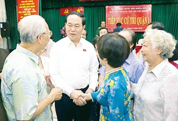 President Trần Đại Quang met with constituents in HCM City yesterday to ease their concerns over a number of socio-economic issues raised at the freshly-concluded first session of the 14th National Assembly. —Photo: SGGP President Trần Đại Quang met with constituents in HCM City yesterday to ease their concerns over a number of socio-economic issues raised at the freshly-concluded first session of the 14th National Assembly. —Photo: SGGP