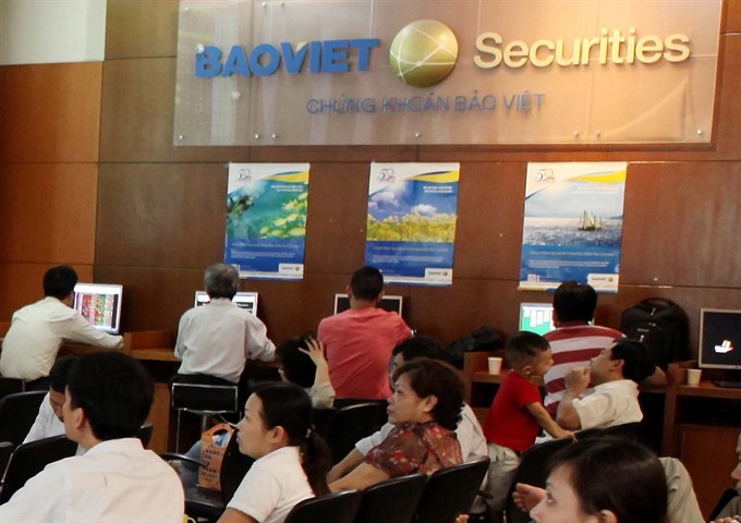 Photo shows a trading session at Bảo Việt Securities Co (BVSC). (Photo: VNA/VNS) Photo shows a trading session at Bảo Việt Securities Co (BVSC). (Photo: VNA/VNS)