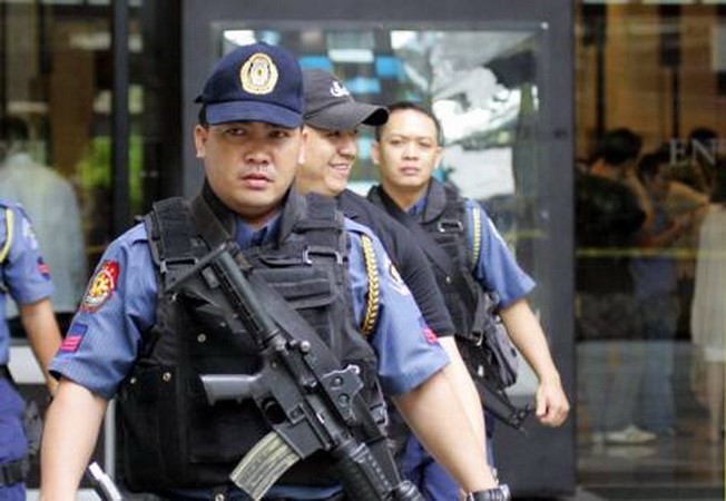 Filipino police (Source: AP) Filipino police (Source: AP)