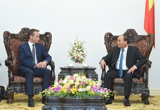 Prime Minister Nguyễn Xuân Phúc (R) receives Danish Minister for Foreign Affairs Kristian Jensen in Hà Nội yesterday. — Photo VGP Prime Minister Nguyễn Xuân Phúc (R) receives Danish Minister for Foreign Affairs Kristian Jensen in Hà Nội yesterday. — Photo VGP