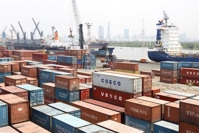 Containers at Sài Gòn Port in HCM City. National Assembly deputies accept the Government’s scenario of a 7.01 percent GDP growth over next five years. (Photo: VNA/VNS) Containers at Sài Gòn Port in HCM City. National Assembly deputies accept the Government’s scenario of a 7.01 percent GDP growth over next five years. (Photo: VNA/VNS)