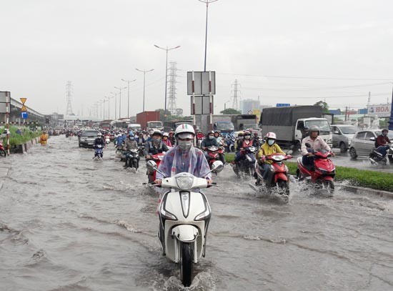Flooding after rain in HCMC. Flooding after rain in HCMC.
