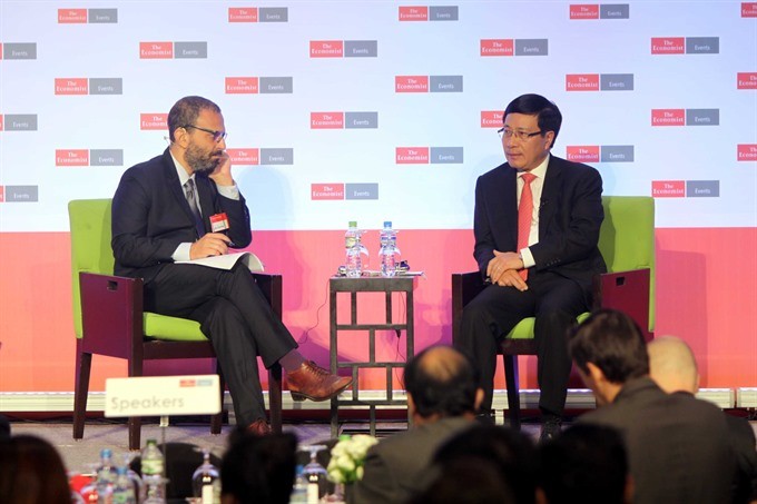 Deputy Prime Minister Phạm Bình Minh (right) speaks at the two-day Việt Nam Summit 2016 that opened yesterday in HCM City. VNS Photo Thanh Vũ Deputy Prime Minister Phạm Bình Minh (right) speaks at the two-day Việt Nam Summit 2016 that opened yesterday in HCM City. VNS Photo Thanh Vũ