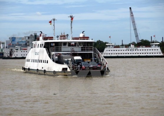 Ferries carry passengers and vehicles at the Cat Lai Ferry Station.