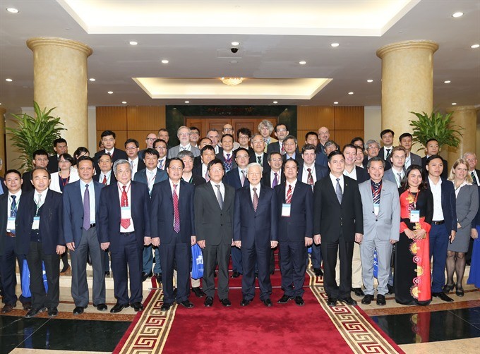 Party General Secretary Nguyen Phu Trong (seventh, left) and Vietnamese delegation at the fifth International Symposium on Vietnamese Studies. — VNA/VNS Photo Tri Dung Party General Secretary Nguyen Phu Trong (seventh, left) and Vietnamese delegation at the fifth International Symposium on Vietnamese Studies. — VNA/VNS Photo Tri Dung