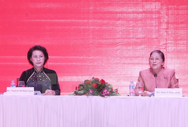 National Assembly Chairwoman Nguyen Thi Kim Ngan and her Lao counterpart Pany Yathotou co-chair a meeting. (Photo: VNA) National Assembly Chairwoman Nguyen Thi Kim Ngan and her Lao counterpart Pany Yathotou co-chair a meeting. (Photo: VNA)
