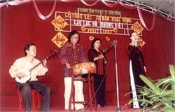 The club members perform Chau Van Singing, a kind of incantation music The club members perform Chau Van Singing, a kind of incantation music
