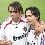 AC Milan's defender Paolo Maldini celebrates with temmate Filippo Inzaghi AC Milan's defender Paolo Maldini celebrates with temmate Filippo Inzaghi