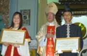 Bishop Nguyen Chu Trinh, Mr. Thinh and his wife at the ceremony. Bishop Nguyen Chu Trinh, Mr. Thinh and his wife at the ceremony.
