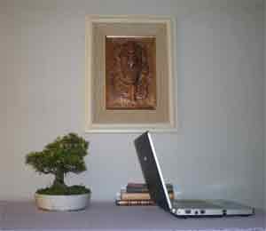 To many, a bonsai tree on the desk will make their work more relaxing To many, a bonsai tree on the desk will make their work more relaxing