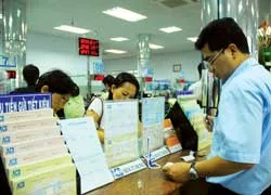 Gửi tiền tiết kiệm thời… mất giá