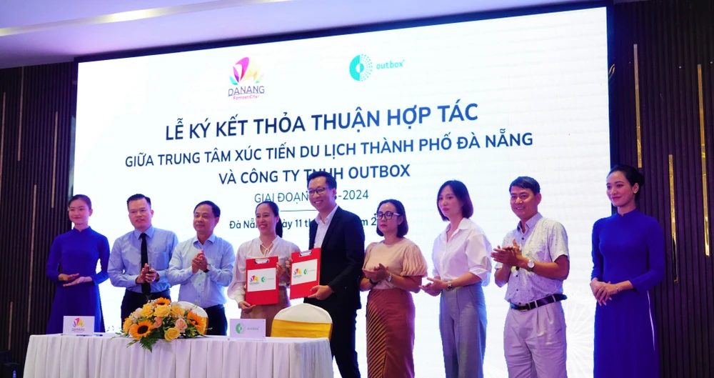 Ký kết thỏa thuận hợp tác. Ảnh: XUÂN QUỲNH