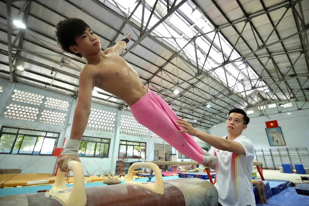 Les jeunes athlètes de l'équipe de gymnastique de Hô-Chi-Minh-Ville s'entraînent dur PSA Anh14- thẻ dục dụng cụ.jpg