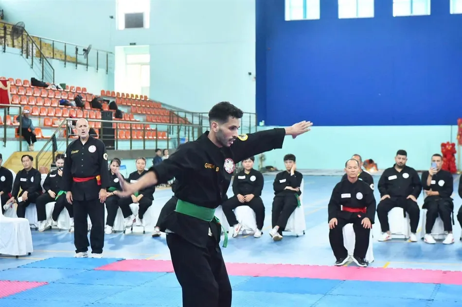 Các học viên được cập nhật những thay đổi về các hình thức thi đấu đối kháng, tiếp nhận 10 bài võ quy định 1000023471.jpg