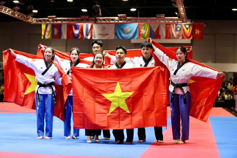 Tuyển taekwondo Việt Nam đã giành 1 HCV nội dung quyền, có sự góp công của các võ sĩ TPHCM. Ảnh: DŨNG PHƯƠNG 