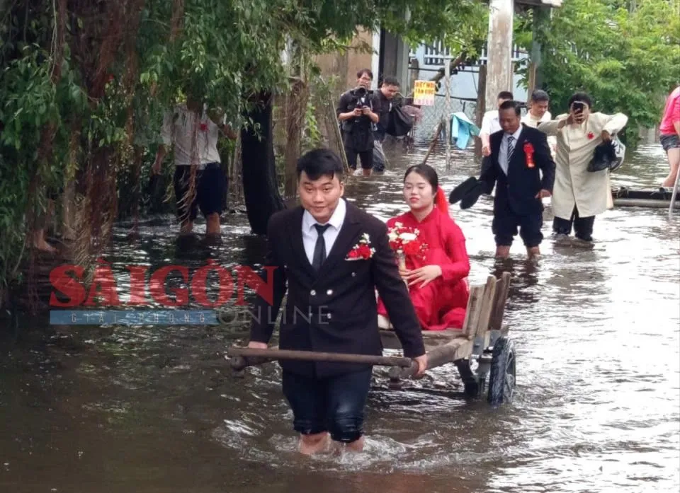 Chú rể dùng xe bò rước cô dâu 28-10-lu-dien-ban-dong-co-dau.jpg