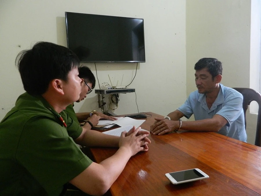 Ông Tính tại cơ quan công an