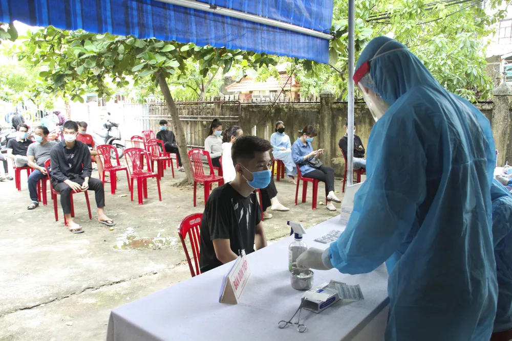 Quảng Trị: Tiến hành xét nghiệm nhanh Covid-19 cho người về từ vùng có dịch  ảnh 9