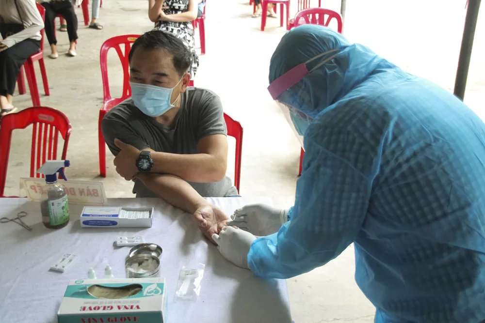 Quảng Trị: Tiến hành xét nghiệm nhanh Covid-19 cho người về từ vùng có dịch  ảnh 4