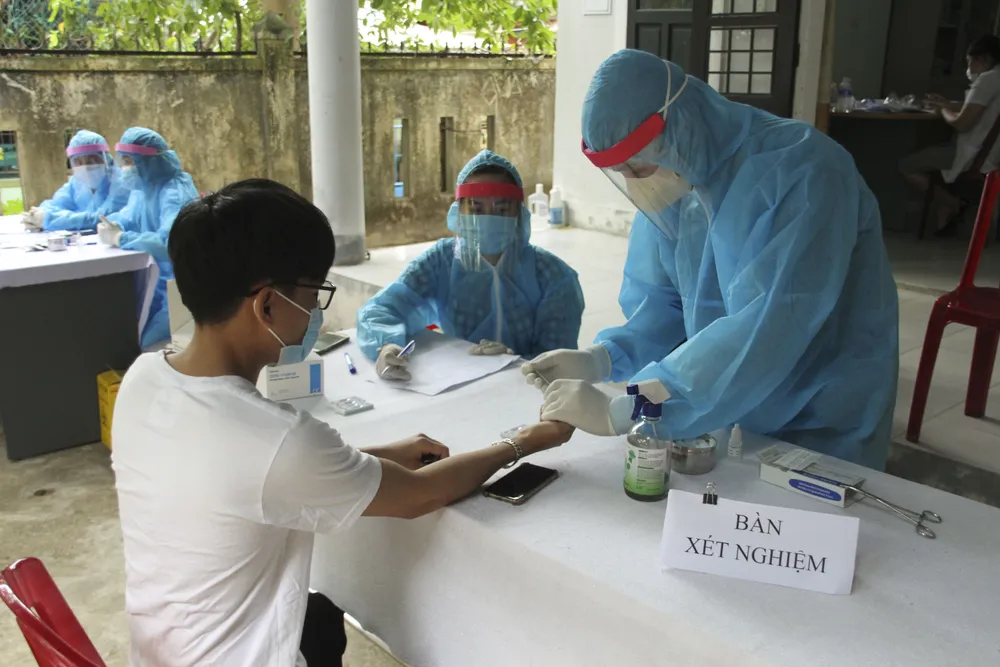 Quảng Trị: Tiến hành xét nghiệm nhanh Covid-19 cho người về từ vùng có dịch  ảnh 8