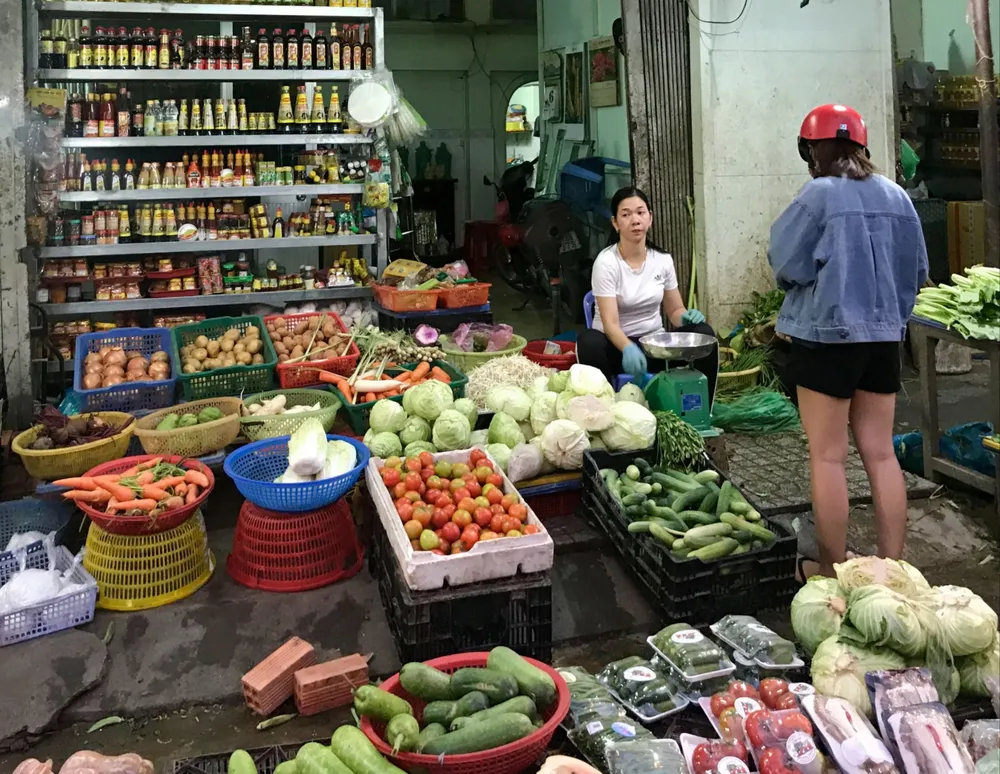 Một hộ kinh doanh nông sản ở chợ Tân Quy, quận 7, TPHCM Q5c.jpg