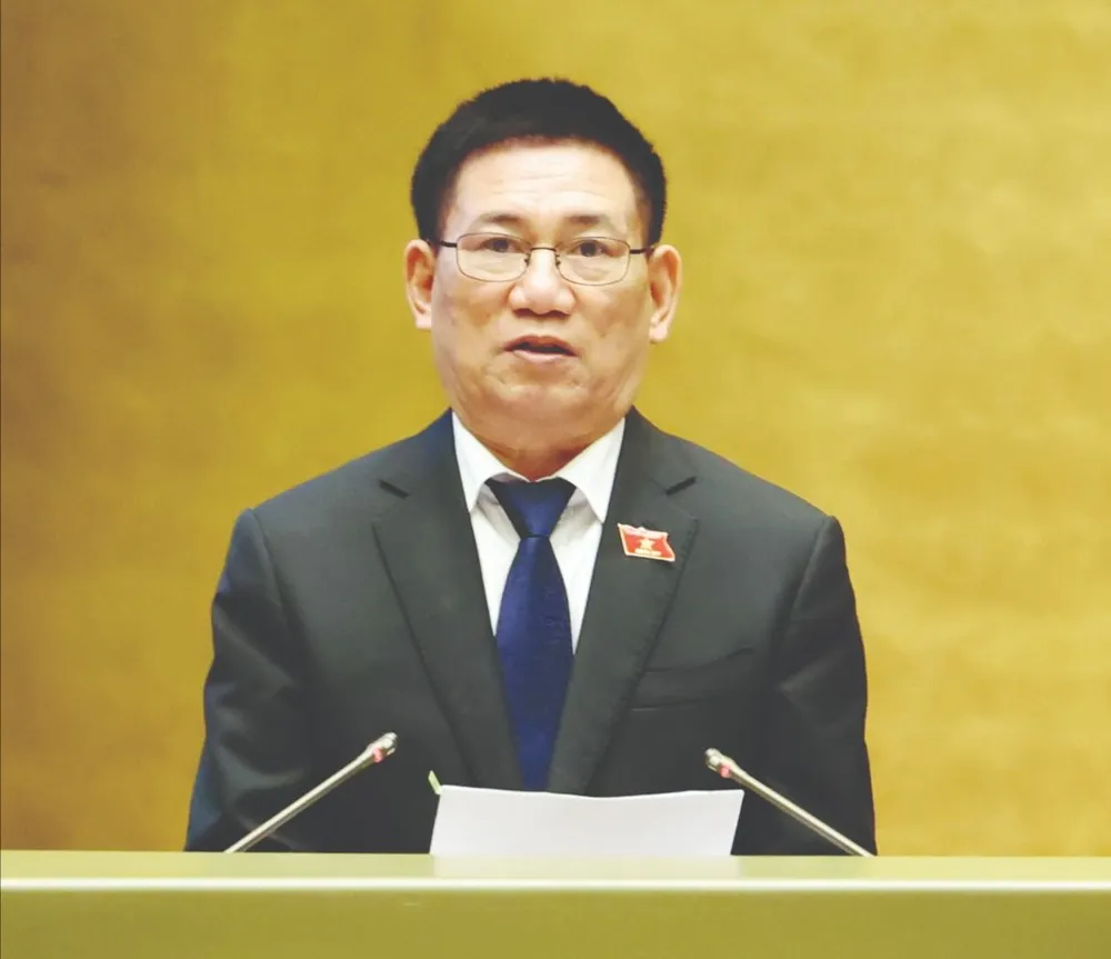 Phó Thủ tướng Hồ Đức Phớc trình bày báo cáo tại kỳ họp thứ 10, chiều 20-10. Ảnh: QUANG PHÚC U2b.jpg