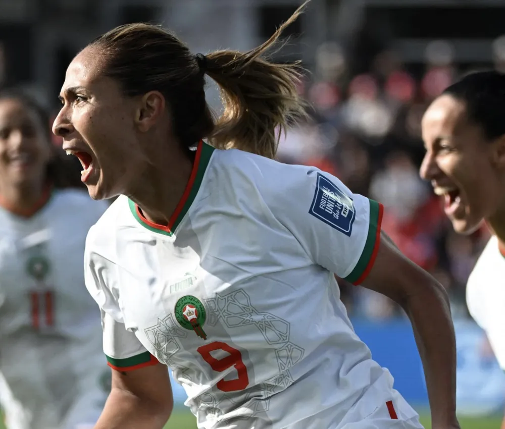 Niềm vui của Jraidi khi ghi bàn thắng mang về chiến thắng lịch sử ở World Cup nữ cho Morocco. Niềm vui của Jraidi khi ghi bàn thắng mang về chiến thắng lịch sử ở World Cup nữ cho Morocco.