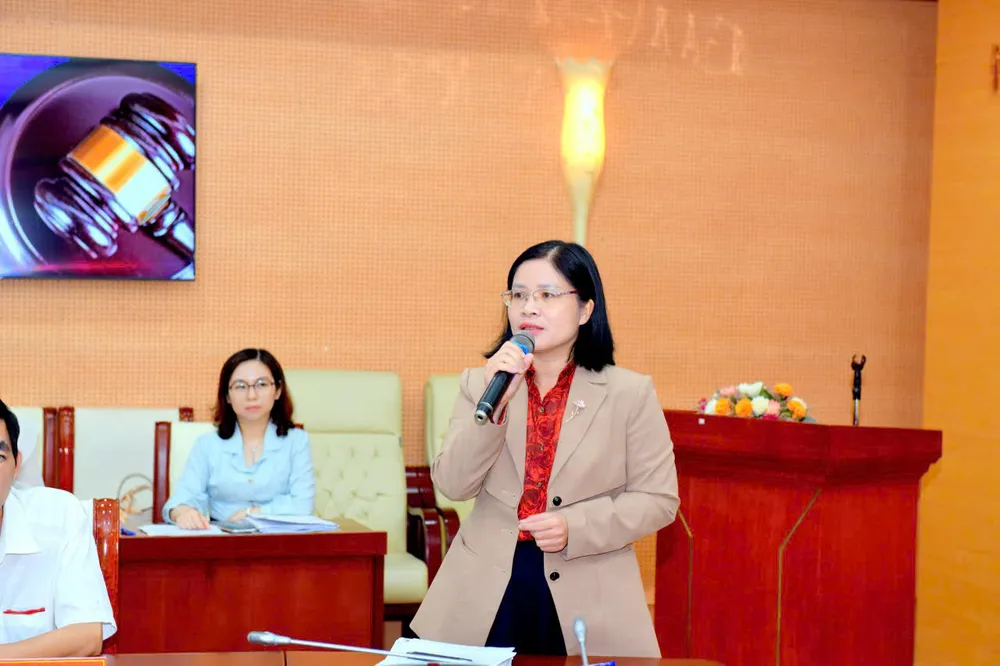 Bà Nguyễn Thị Minh Thơ, Phó Cục trưởng Cục Phòng, chống rửa tiền (NHNN), trình bày tại hội thảo z7121995078525_260612323792c34c340871f593c5aedc.jpg