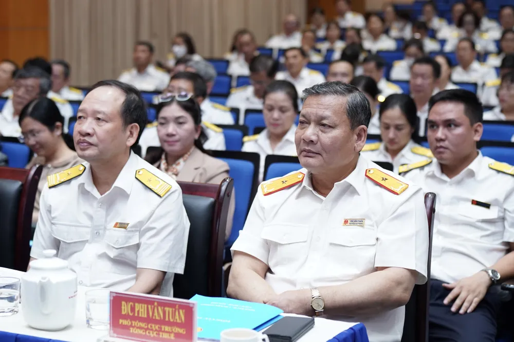 Phó Tổng cục trưởng Tổng cục Thuế Phi Vân Tuấn tại hội nghị sơ kết công tác thuế 6 tháng đầu năm của Cục Thuế TPHCM. Ảnh: HOÀNG HÙNG