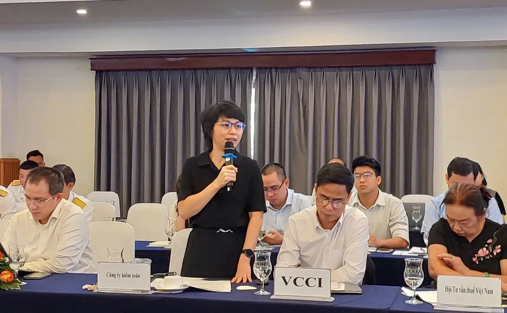 Đại diện Công ty kiểm toán KPMG phát biểu tại hội thảo. Ảnh: M.HOA 603be3a2b144381a6155.jpg