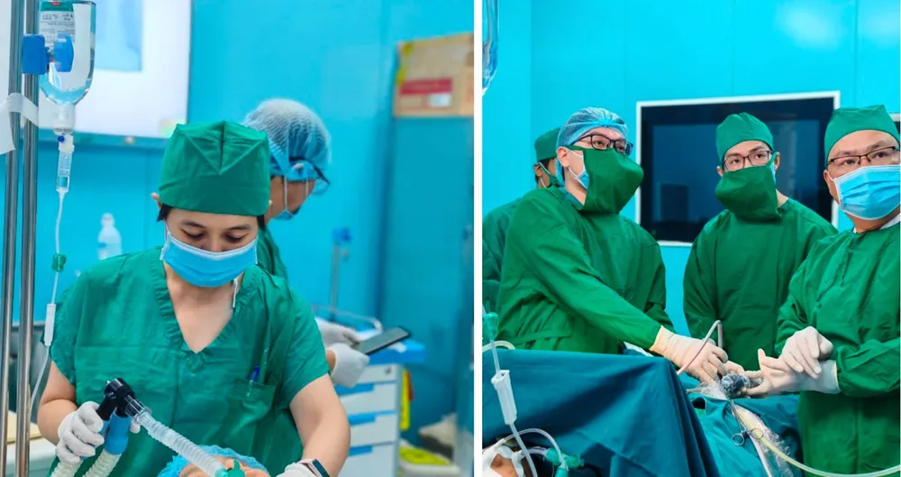 BS-CKI Nguyễn Thị Thanh Trúc (BV Bình Dân) trực tiếp gây mê, BS-CKII Vũ Khương An (BV Bình Dân) phẫu thuật viên chính cùng với êkíp y, bác sĩ của Trung tâm Y tế Quân dân y Côn Đảo đang phẫu thuật nội soi cho người bệnh Con Dao.jpg