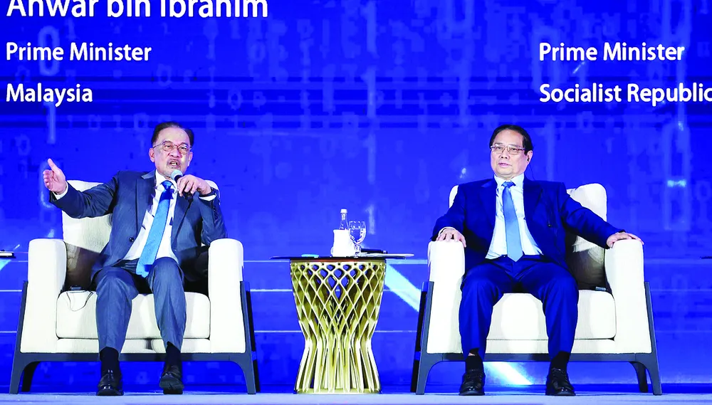 Thủ tướng Phạm Minh Chính và Thủ tướng Malaysia Anwar Ibrahim tham dự Phiên thảo luận về “Lưới thông minh thông qua kết nối trí tuệ nhân tạo (AI) tự chủ” tại Malaysia, sáng 28-5 %1f.jpg