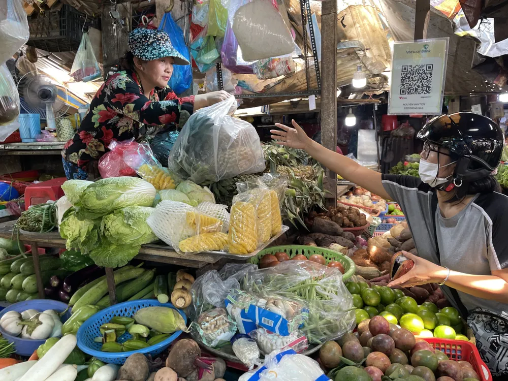 Hộ kinh doanh nông sản tại chợ Thái Bình, quận 1, TPHCM. Ảnh: HOÀNG HÙNG $6b.jpg