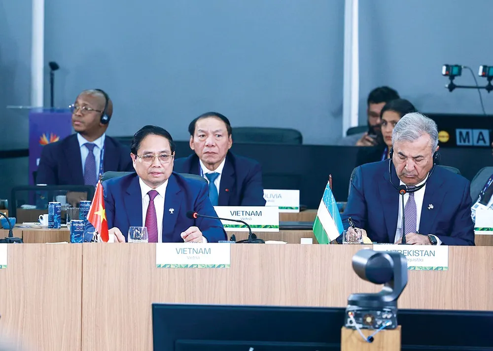 Thủ tướng Phạm Minh Chính phát biểu tại Phiên thảo luận cấp cao “Tăng cường chủ nghĩa đa phương, các vấn đề kinh tế - tài chính và trí tuệ nhân tạo”. Ảnh: TTXVN H1n.jpg